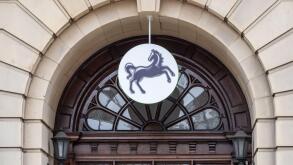 Lloyds Bank black horse logo framed by a classical doorway, Northampton, UK