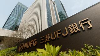 A new signboard of MUFG on display outside its building on April 2, 2018, Tokyo, Japan. Mitsubishi UFJ Financial Group Inc. changed the name of Bank of Tokyo-Mitsubishi UFJ to MUFG Bank after 11 years of merger and complaints from customers saying that th