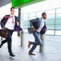 Businessmen running