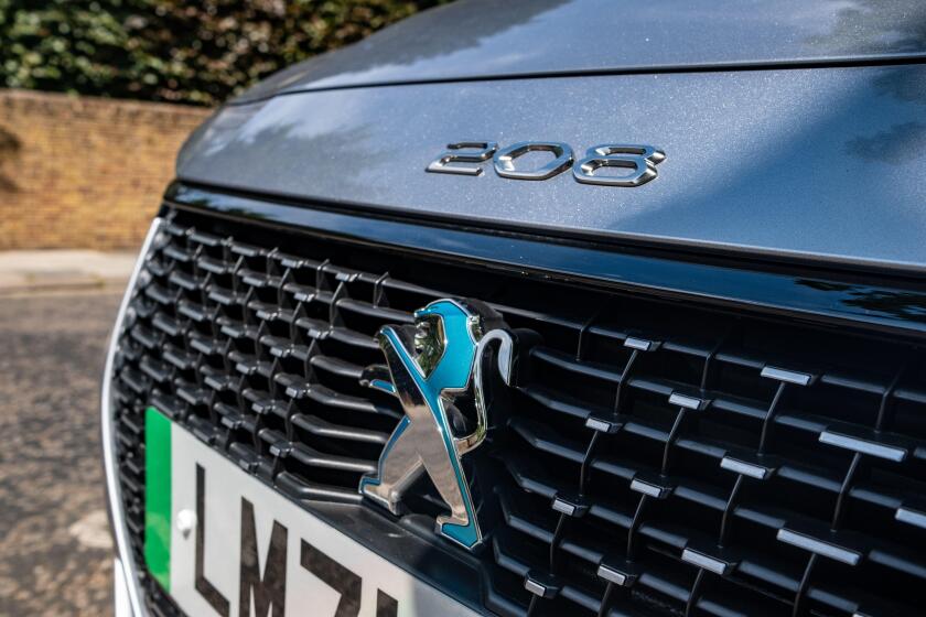 London- July 2022: Peugeot e 208 electric and hybrid model from French car manufacturer.