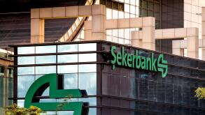 Close up of the logo and banner of public owned enterprise Sekerbank at Istanbul headquarters in Levent, Istanbul, Turkey.