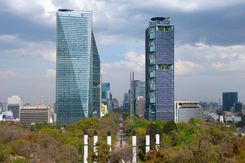 Torre Mayor and Torre BBVA on Avenue Paseo de la Reforma aerial view from top of Chapultepec Hill in Mexico City CDMX, Mexico.