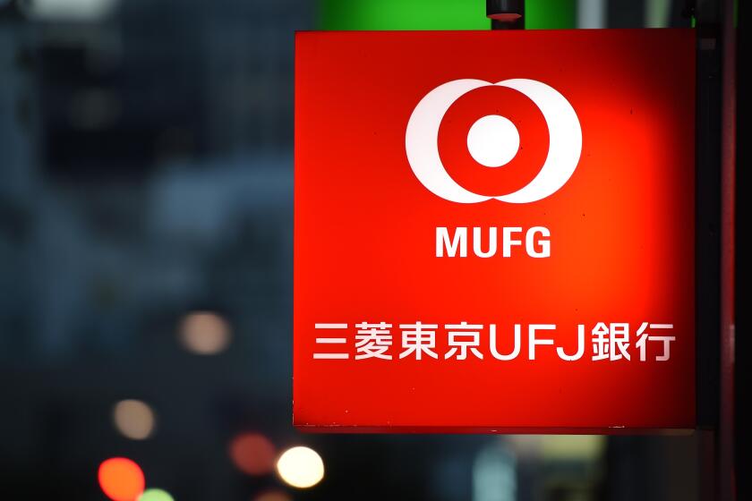 A signboard of the Bank of Tokyo-Mitsubishi UFJ is seen on January 14, 2016 in Tokyo, Japan. Mitsubishi UFJ Financial Group Inc., Japans biggest bank, agreed to buy a 20 percent stake in Philippine lender Security Bank Corp. for the equivalent of $773 mil
