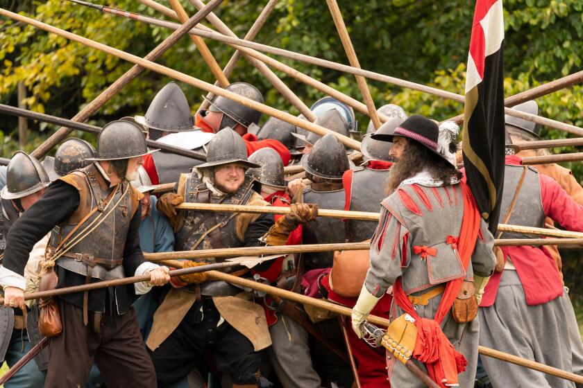 Push of pike where two opposing columns of pikemen meet and become locked in position. English civil war reenactment, Siege of Basing House 16.09.23