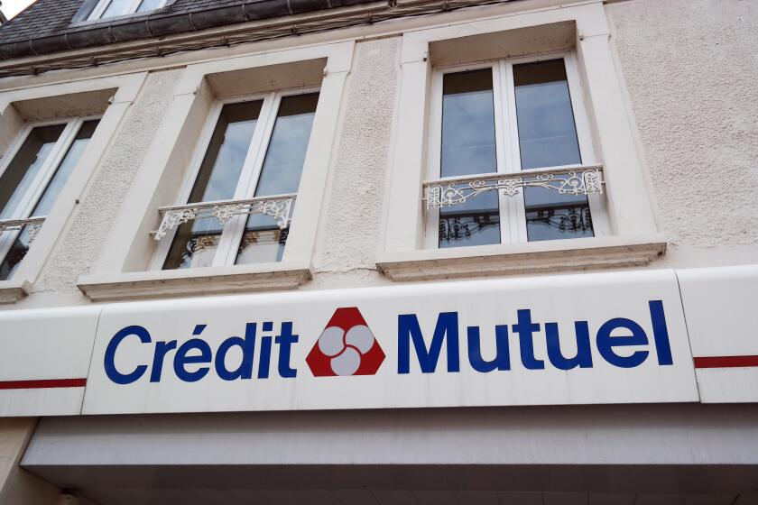 CARENTAN, FRANCE - JULY 2014: Branch of Credit Mutuel in Normandy. Credit Mutuel is a major French bank