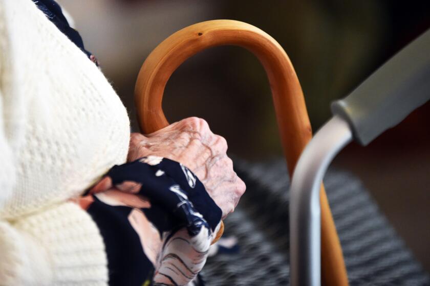 Elderly woman in a care home UK