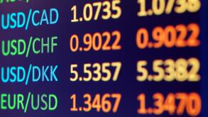 Currency exchange rates on LCD display closeup