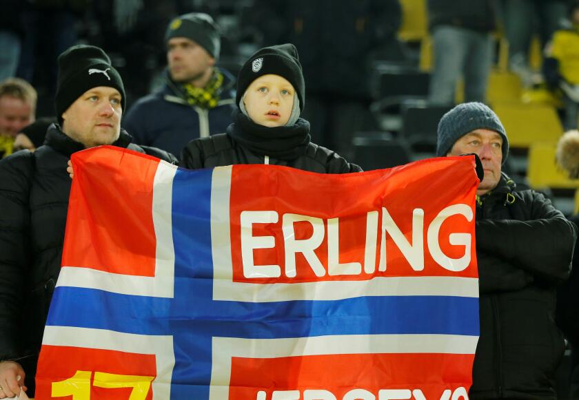 Soccer Football - Bundesliga - Borussia Dortmund v FC Cologne - Signal Iduna Park, Dortmund, Germany - January 24, 2020   Fans inside the stadium hold up a Norway flag including the name of Borussia Dortmund's Erling Braut Haaland   REUTERS/Leon Kuegeler 