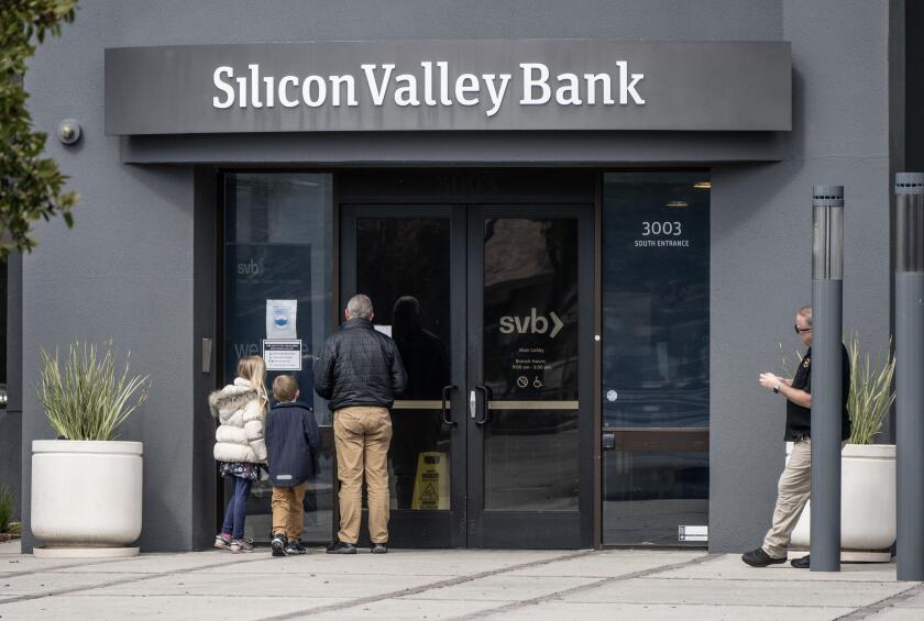 Santa Clara, United States. 11th Mar, 2023. Visitors read a message iposted on the lobby door of the Silicon Valley Bank in Santa Clara, California on Saturday, March 11, 2023. On March 10, the FDIC took over the bank after it collapsed. Photo by Terry Sc