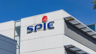 Utrecht, Netherlands - 15 July 2026: Modern office building architectural exterior featuring the SPIE company logo on white facade against blue sky.