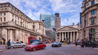 Traffic in Threadneedle Street, London, with the Bank of England, and the Royal Exchange.