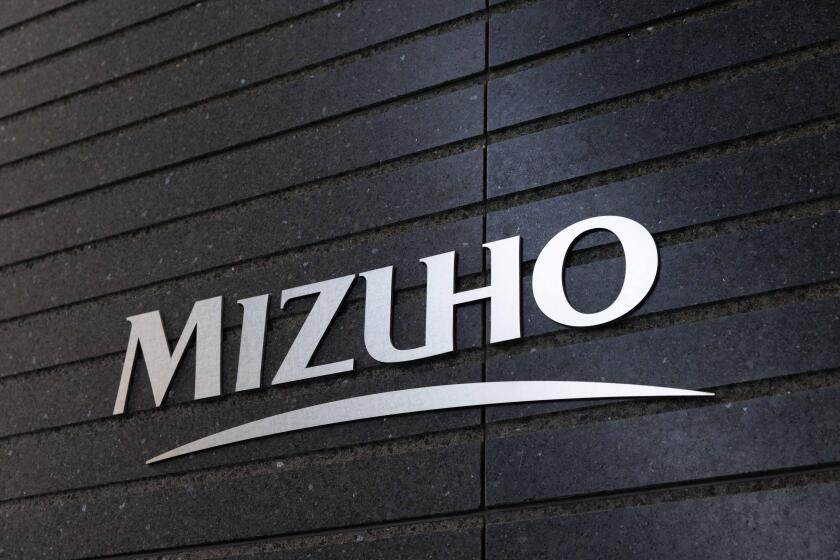 Logo of Mizuho Bank on their headquarter building in Otemachi, Tokyo on November 25, 2022.