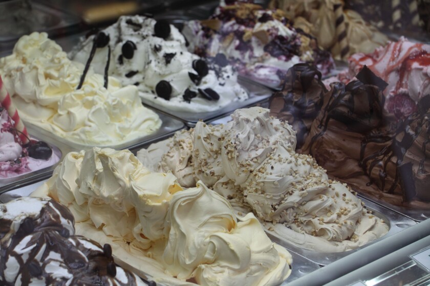 Various ice cream flavours in trays