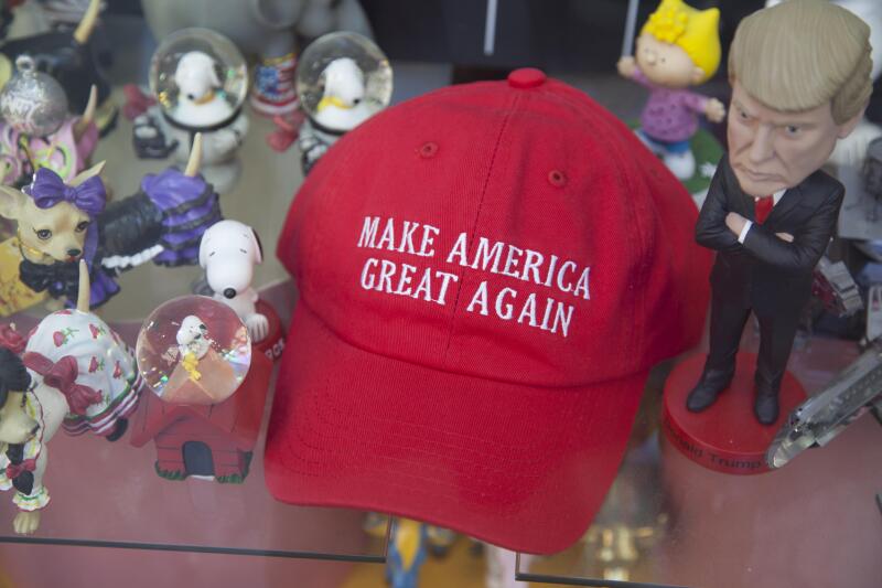 Caricature of Donald Trump with hisiconic red hat at a souvenir shope in New York City.
