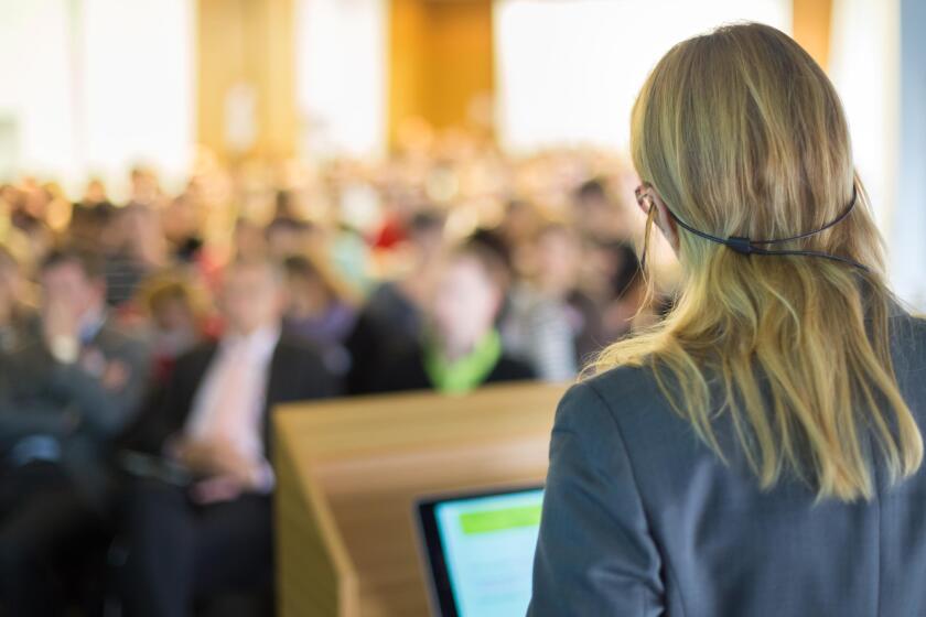 Speaker at Business Conference and Presentation.
