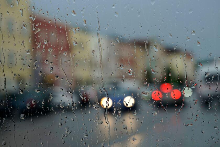 germany,bavaria,upper bavaria,neuotting,rainy weather,window pane,raindrops,traffic,unclear