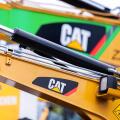 MUNICH / GERMANY - APRIL 14, 2019: Caterpillar logo on a digger arm at a CAT machine dealer.