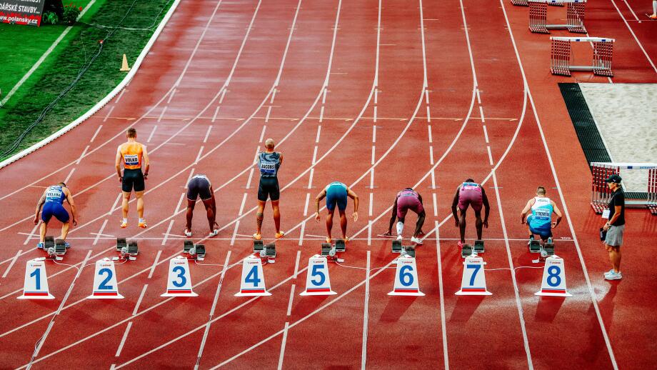 OSTRAVA, CZECHIA, MAY 28, 2024: Elite Sprinters at the 100-Meter Starting Line. Track and Field Sport Photo. Back View. Pre race before summer olympic