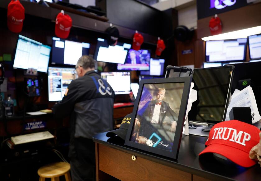 New York, United States. 03rd Apr, 2025. Trump Maga merchandise is present on the floor of the New York Stock Exchange as traders work on Wall Street on Thursday, April 3, 2025 in New York City. The Dow Jones Industrial Average opened today down over 1000