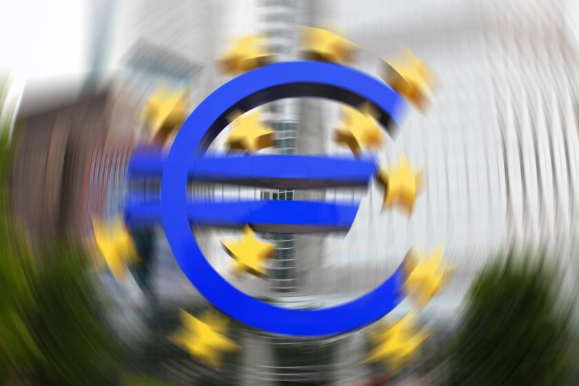 EURO crisis - European Central Bank (ECB) with the Euro sign outside in Frankfurt (Main)