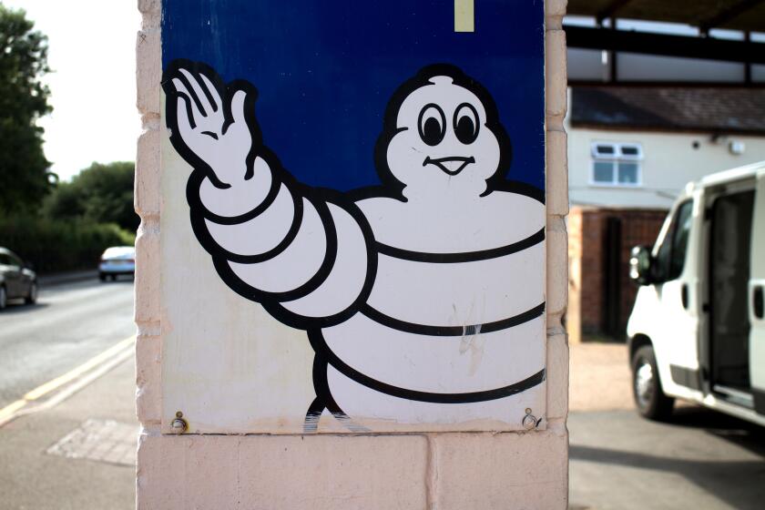 Michelin man sign outside a garage