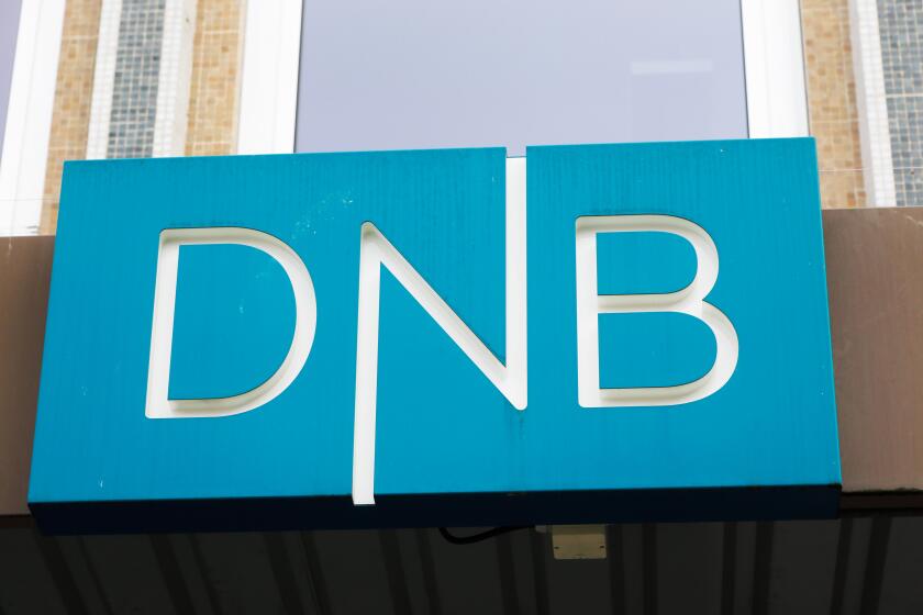 Trondheim, Norway - September 26, 2015: Close-up of the sign at the DNB office entrance. DNB is a Norwegian financial services group.