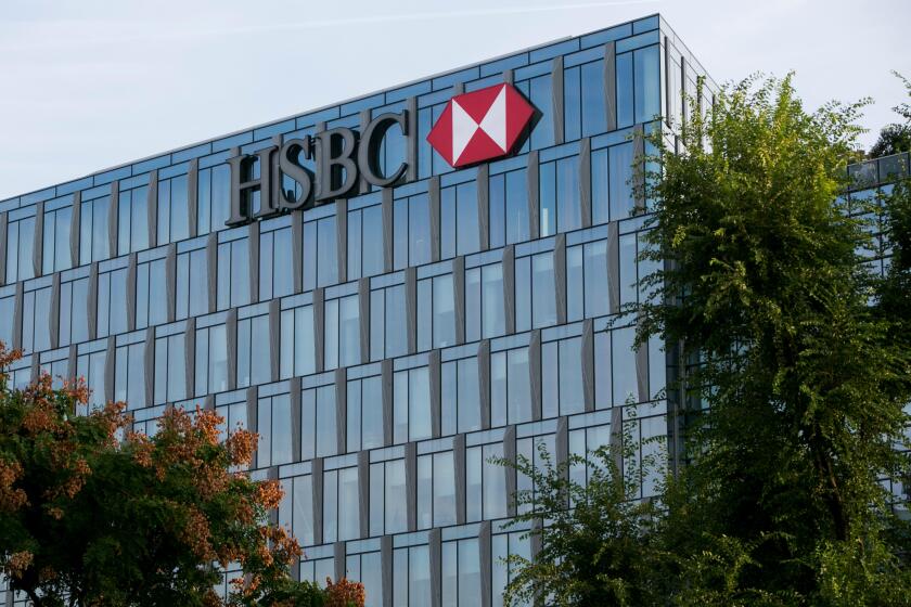 A logo sign outside of a facility occupied by HSBC Bank in Milan, Italy on September 3, 2016.