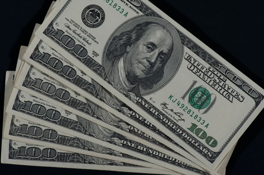 six $100 dollar bills