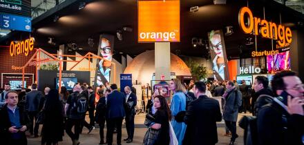 ORANGE brand at company's pavilion during the GSMA Mobile World Congress 2023 in Barcelona, the world's most important event on mobile devices communications bringing together the leading companies and the latest developments in the sector.