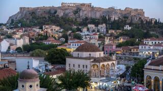 Night view of Monastiraki Square and the Acropolis in Athens, Greece