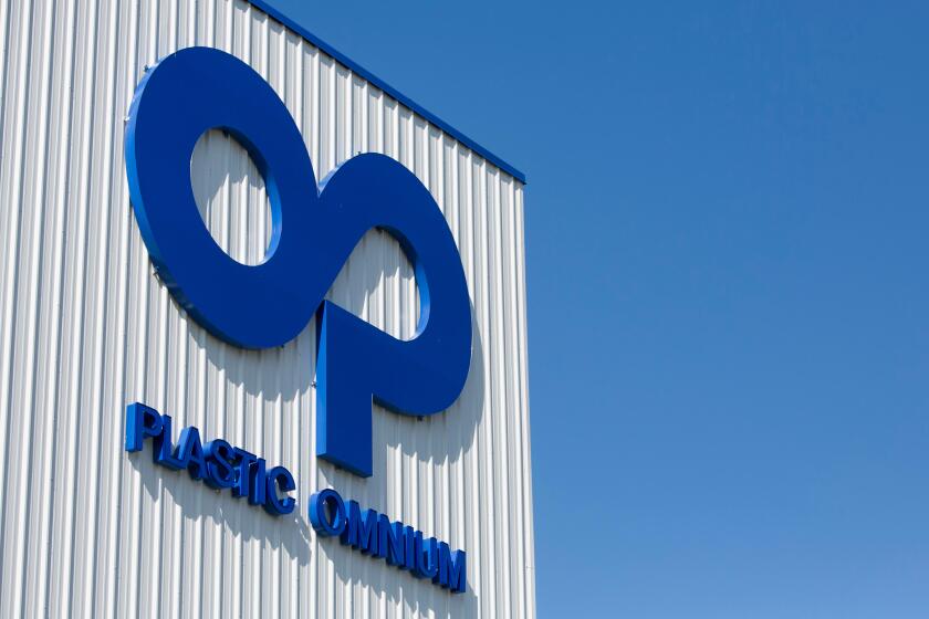 A logo sign outside of a facility occupied by Plastic Omnium in Kansas City, Kansas on August 23, 2015.
