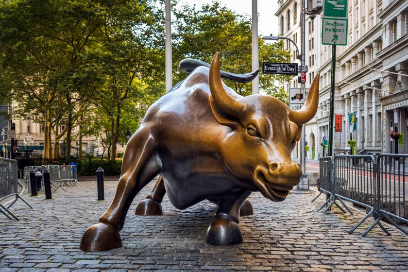 The "Charging Bull" bronze sculpture, Lower Manhattan, New York, USA