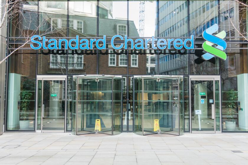 Exterior of Headquarters of the Standard Chartered Bank on Basinghall Avenue in London, England, UK