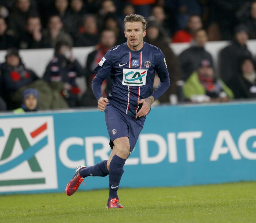 Paris Saint-Germain's English midfielder David Beckham during the French Cup football match Paris Saint-Germain (PSG) vs Olympique de Marseille (OM) at the Parc-des-Princes stadium  Featuring: David Beckham Where: Paris, France When: 27 Feb 2013