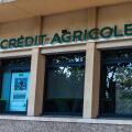 Narbona, France - June 18, 2024: Sign and logo of Credit Agricole bank office in Narbona or Narbonne, Occitanie, France