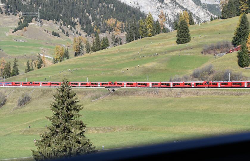 Bergun. 29th Oct, 2022. The world's longest narrow gauge passenger train runs on the Rhaetian Railway in Switzerland, Oct. 29, 2022. The world's longest narrow gauge passenger train of Swiss Rhaetian Railway entered Saturday the Guinness Book of Records. 