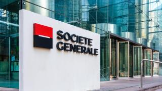 Sign of the Societe Generale at the entrance of the head office of the french banking group in La Defense business district.