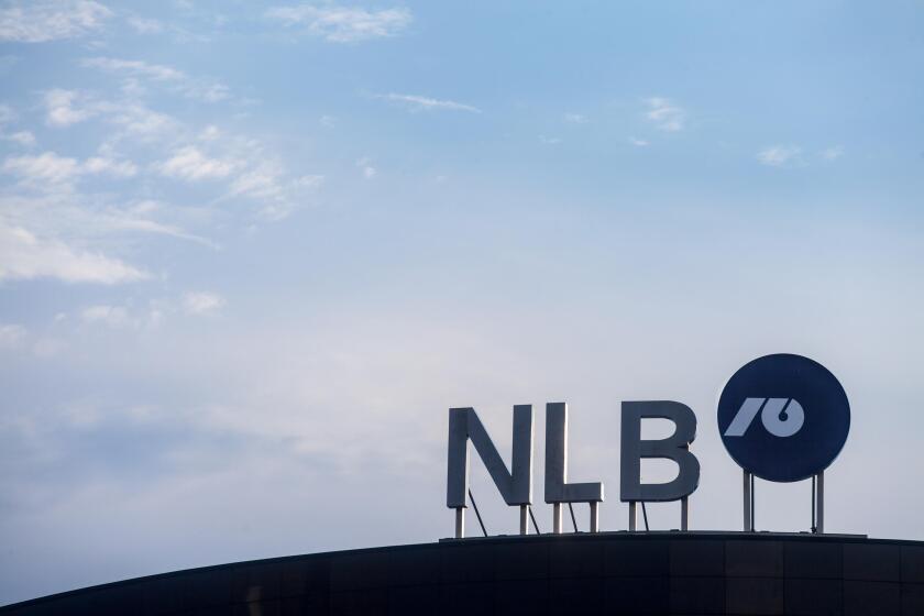 BELGRADE, SERBIA - AUGUST 1, 2018: NLB Bank Group logo on their main office for Serbia. NLB Group, formerly Ljubljanska Banka, is a Slovenian bank & f