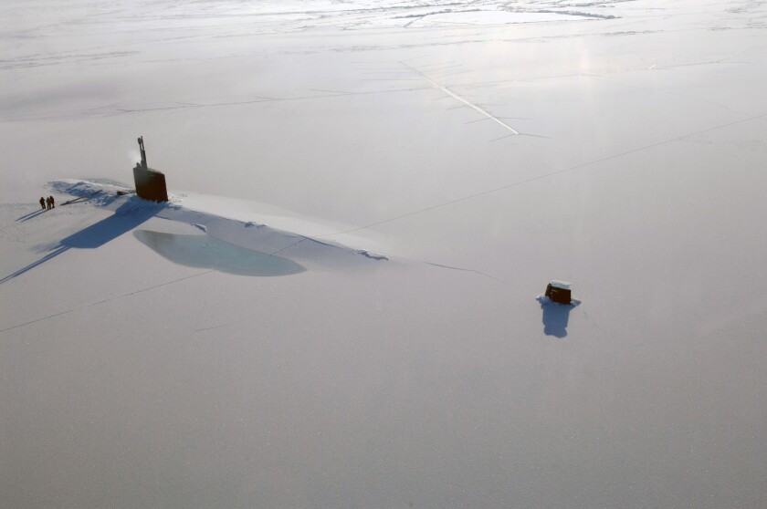The US Navy Los Angeles-class nuclear attack submarine USS Annapolis after breaking through three feet of ice while participating in Ice Exercise March 21, 2009 in the Arctic Ocean.