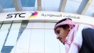 A man passes the Saudi Telecom STC office in Riyadh, Saudi Arabia February 6, 2018. REUTERS/Faisal Al Nasser