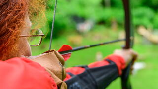 Woman archery, Millstatter See, Nockberge, Niedere Tauern, Carinthia, Austria