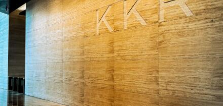 Signage for private equity firm KKR in the entrance lobby to 30 Hudson Yards, New York, USA