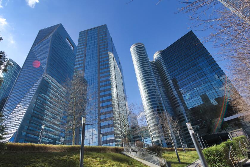 Up in the sky, The business district of Paris - Courbevoie, La Defense a sunny day with clear blue sky