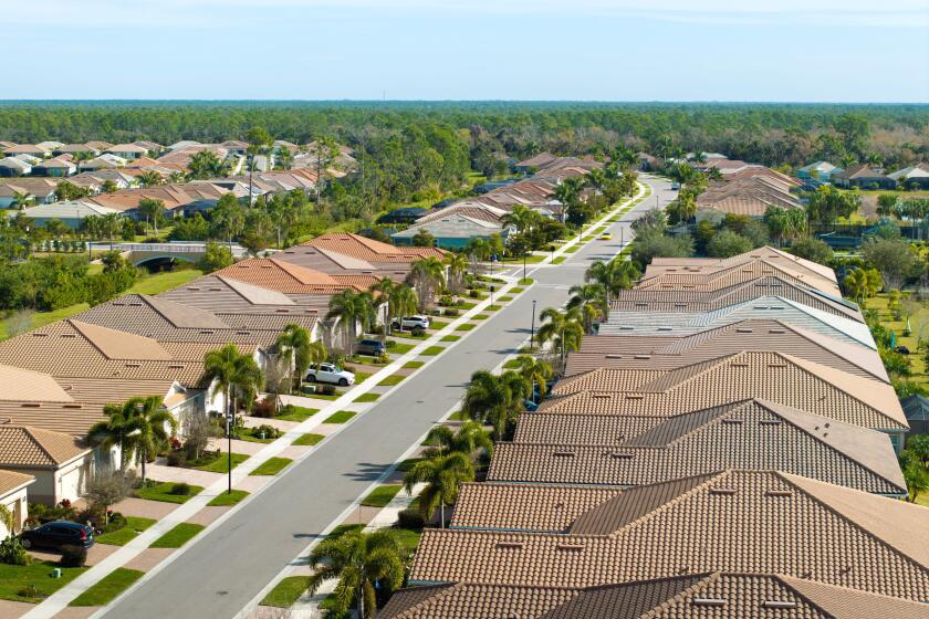 Wealthy neighborhood with expensive houses in southern Florida. Development of US premium housing market