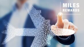 Air miles rewards with person touching airplane shape, frequent flyer loyalty program to earn points and bonuses for travel benefits like elite cards,
