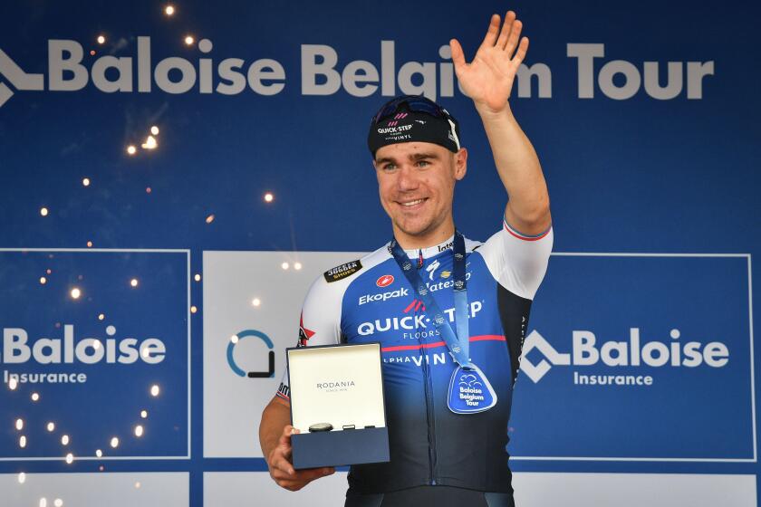 Dutch Fabio Jakobsen of Quick-Step Alpha Vinyl celebrates on the podium after winning the final stage of the Baloise Belgium Tour cycling race, 189,9km from Gingelom to Beringen, Sunday 19 June 2022. The Baloise Belgium Tour takes place from 15 to 19 June