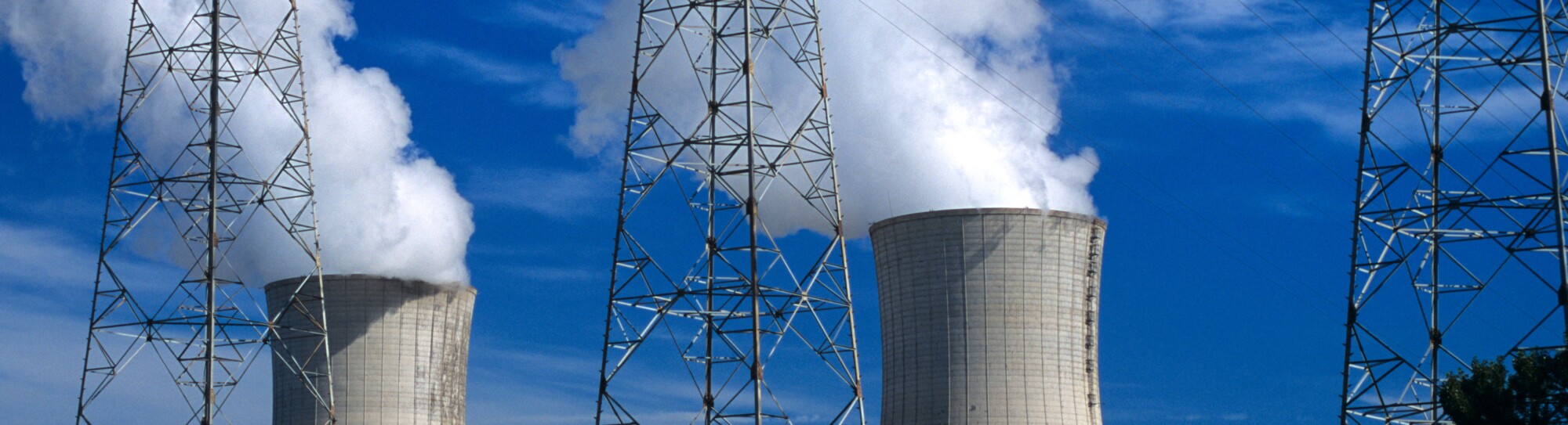 Cooling Towers & Electricity Pylons of Tricastin Nuclear Power Plant, or Nuclear Power Station, Rhone Valley, France