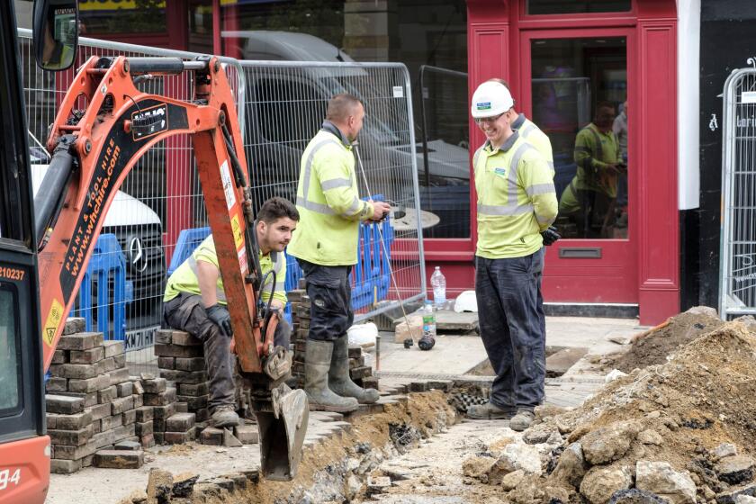 Severn Trent workers in Glocester City centre. Digging up the Road.