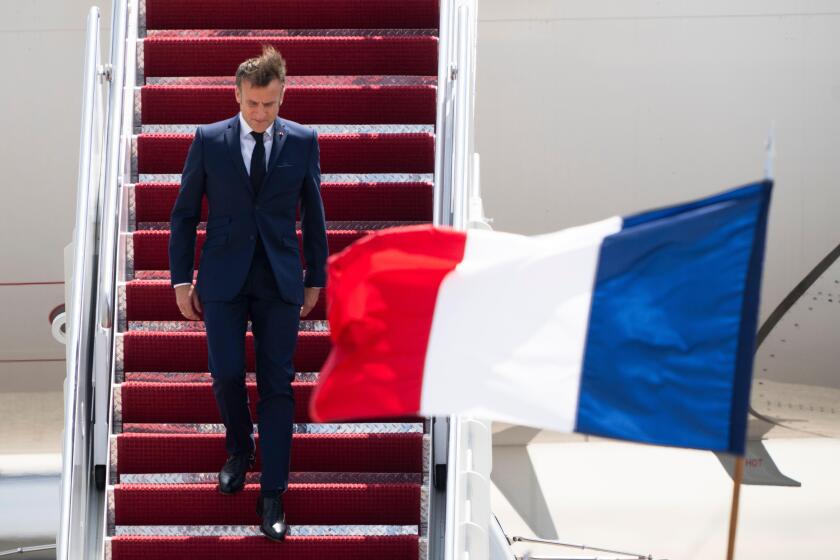 French President Emmanuel Macron arrives Wednesday, July 10, 2024, at Andrews Air Force Base, Md., to attend the NATO summit in Washington. (AP Photo/Manuel Balce Ceneta)