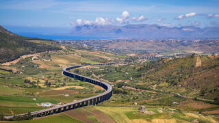 The Autostrade as it winds its way along the North Sicilian coast from the Greek Theater at Segesta, Sicily